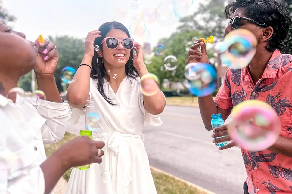 young woman surrounded by bubbles